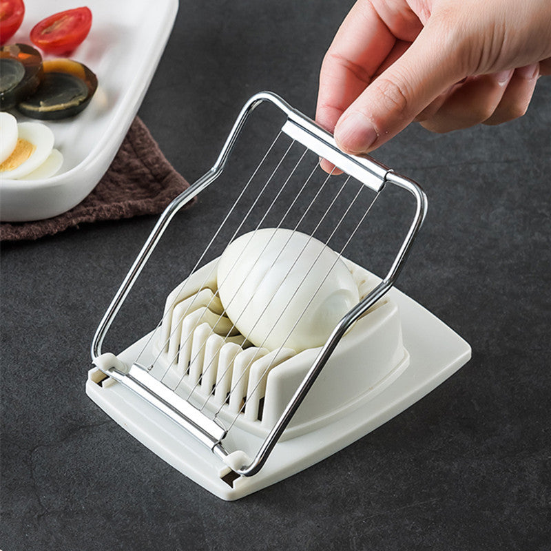 Multi-functional egg cutter